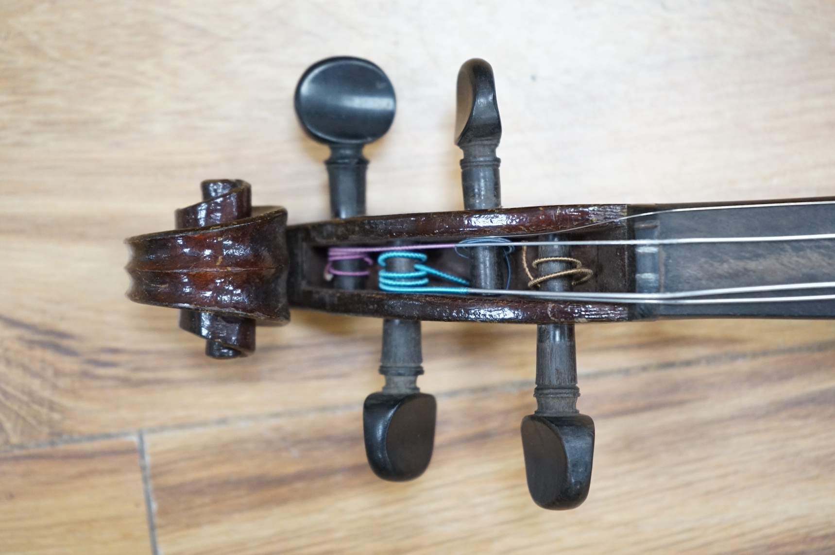 A cased violin, label to interior reads ‘Dulcis et Fortis’, back 36cm. Condition - scratches